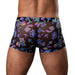 Rear view of male wearing black sheer pouch shorts with colorful psychedelic mushroom print.