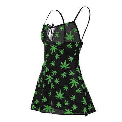 Black mesh dress with green leaf pattern, adjustable straps, lace detail, and front tie, paired with matching g-string.