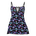 Black mesh dress with colorful neon mushroom print, lace detail, and adjustable thin straps.