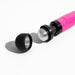 Close-up of hot pink Doxy Die Cast 3 compact wand vibrator with detachable black silicone head on white background.