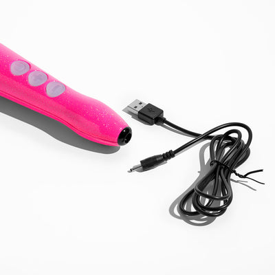 Hot pink compact rechargeable wand vibrator with control buttons and USB charging cable on white background.
