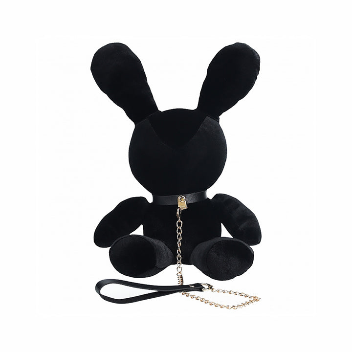 Small black velvet rabbit plush with collar and gold chain leash accessory for playful bondage.