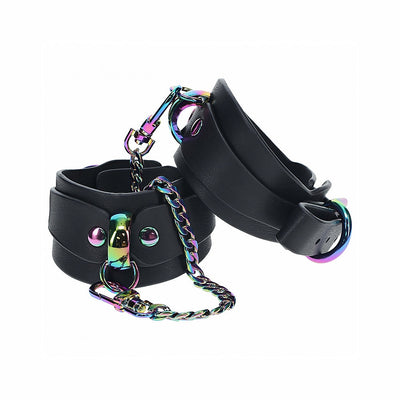 Black bonded leather handcuffs with iridescent metal hardware and connecting chain from the Ouch! Venice Collection.
