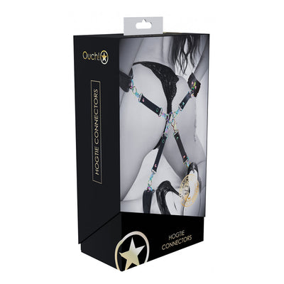 Packaging of Ouch! Venice Collection Hogtie Connectors showing iridescent hardware and black bonded leather straps in use.