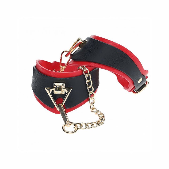 Black and red bonded leather leg cuffs with gold-tone chain and hardware from the Ouch! Milan Collection