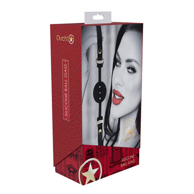 Ouch! Milan Collection Silicone Ball Gag packaging with black silicone gag and adjustable bonded leather straps shown on a model.