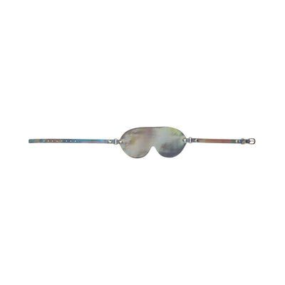Iridescent bonded leather blindfold with adjustable strap and buckle closure from the Ouch! Paris Collection.