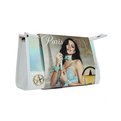 White iridescent handbag featuring a Paris-themed graphic with a woman wearing blue lace accessories and gold star accents.