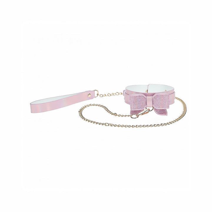 Pink bonded leather collar with rhinestone bow and matching leash with gold chain and handle loop
