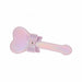 Iridescent pink heart-shaped paddle with a decorative bow adorned with rhinestones on the handle.