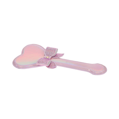 Pink iridescent heart-shaped paddle with a sparkling rhinestone bow accent on a white background.