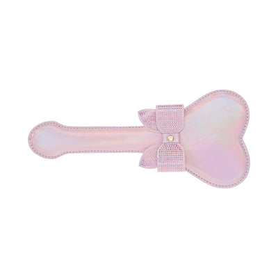Iridescent pink heart-shaped paddle with a decorative bow adorned with small crystals on the handle.