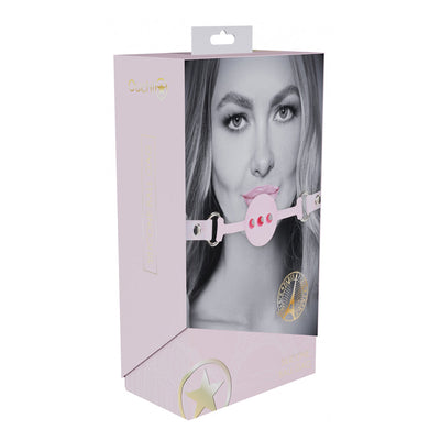 Packaging of Ouch! Paris Collection Silicone Ball Gag featuring a black and white photo of a woman wearing the pink silicone gag with adjustable straps.