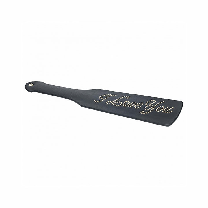 Black bonded leather paddle with studded "I Love You" design and a wrist hole on the handle.