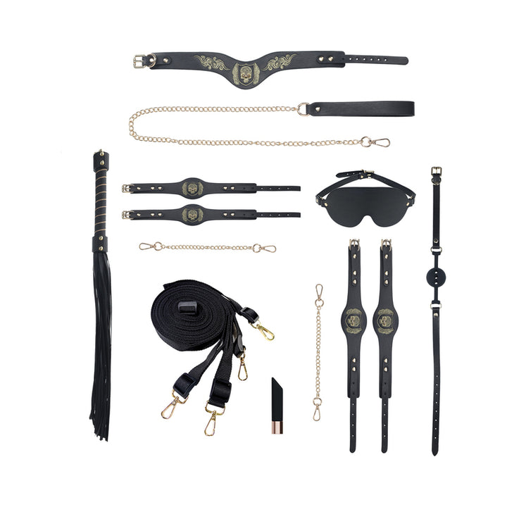 Ouch! London Collection Kit with black leather cuffs, leash, blindfold, flogger, ball gag, restraints, and vibrating bullet on white background