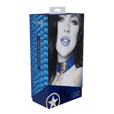 Packaging box of Ouch! Florence Collection collar and leash featuring a blue textured collar with gold hardware on a model.