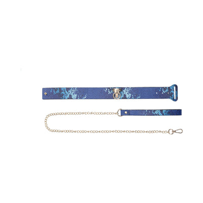 Blue snakeskin-patterned collar and matching leash with gold chain and hardware on white background