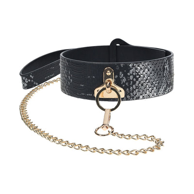Black textured bonded leather collar with gold-tone ring and matching gold chain leash.