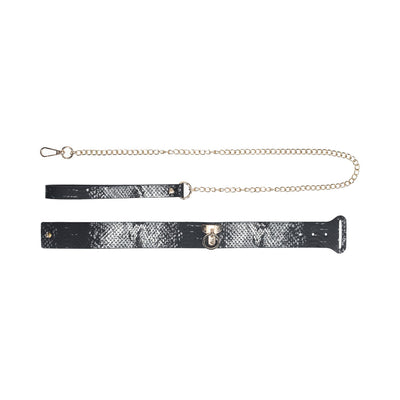 Black and silver snake-print collar and matching chain leash with gold hardware from the Ouch! Florence Collection.
