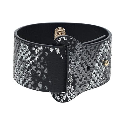 Black and silver snakeskin-patterned bonded leather handcuff with gold-tone hardware from the Florence Collection.
