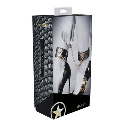 Packaging box of Ouch! Florence Collection Leg Cuffs featuring black bonded leather cuffs with iridescent hardware and chain detail.