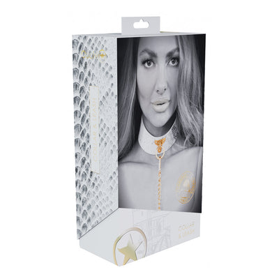 Packaging box of Ouch! Florence Collection Collar and Leash featuring a black and white photo of a woman wearing the collar with gold hardware.