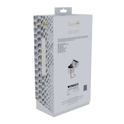 Packaging box of Ouch! Florence Collection Leg Cuffs featuring a snakeskin pattern and product image with iridescent hardware details.