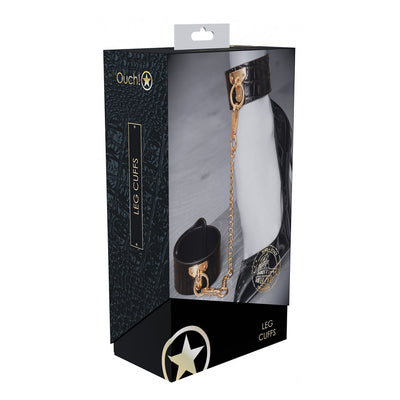 Packaging of Ouch! Rome Collection Leg Cuffs featuring black bonded leather cuffs with gold chain and hardware.