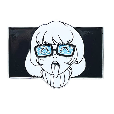 Enamel pin featuring a stylized girl with glasses reflecting chess knights, sticking out her tongue against a black rectangular background.