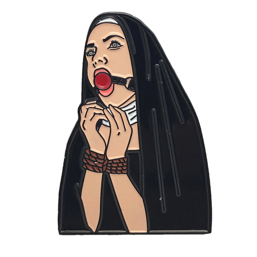 Enamel pin featuring a stylized nun with hands tied and a red ball gag, wearing a black habit and white collar.