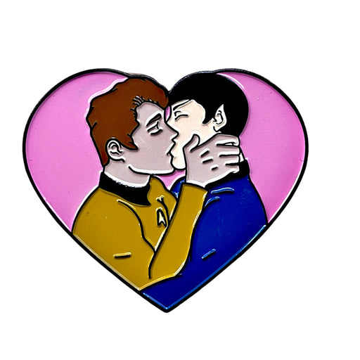 Enamel pin featuring two men in Star Trek uniforms sharing a kiss inside a pink heart background.