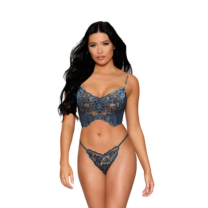 Model wearing a navy blue lace bustier with floral detailing and matching lace G-string lingerie set.