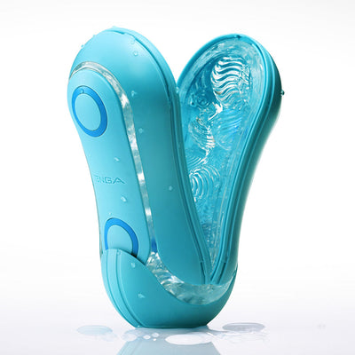 Tenga Flip Orb Ocean Blue open showing textured interior and soft elastomer casing with water droplets on white background.