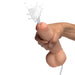 Hand holding an 8-inch realistic dual density dildo with squirting feature and fluid ejecting from the tip.