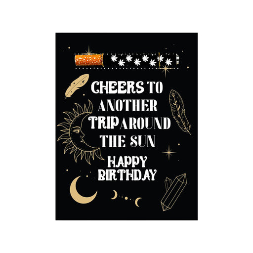 Black birthday card with celestial designs and the message Cheers to Another Trip Around the Sun Happy Birthday, includes a one-hitter pipe.