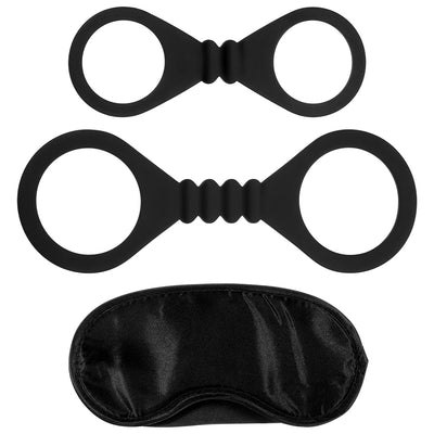 Black stretchy silicone wrist and ankle cuffs with a soft black satin blindfold for comfortable restraint.
