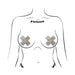 Illustration of a torso wearing Pastease Plus X Shattered Glass Disco Ball Glitter white cross nipple pasties.