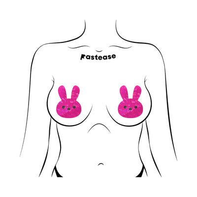 Illustration of a torso wearing bright pink glittery bunny-shaped nipple pasties by Pastease.