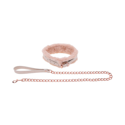 Peach-colored faux fur collar with rose gold chain leash and adjustable buckle on white background.