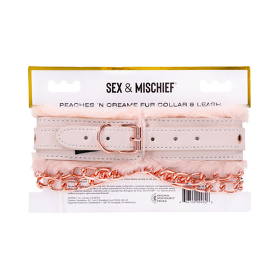 Peach-colored faux fur collar with rose gold buckle and matching chain leash on white packaging labeled Sex & Mischief.