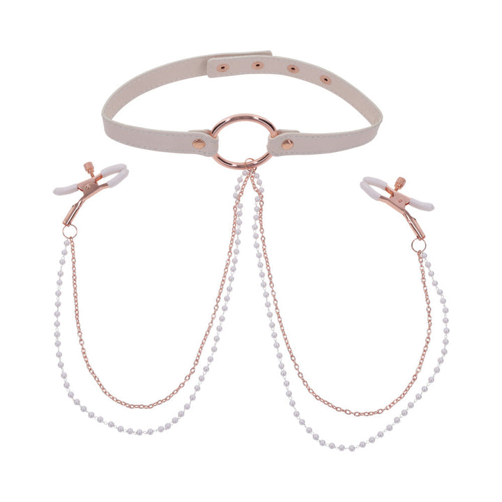 Peach-colored adjustable collar with rose gold ring and attached rose gold nipple clamps with white faux pearl chains.