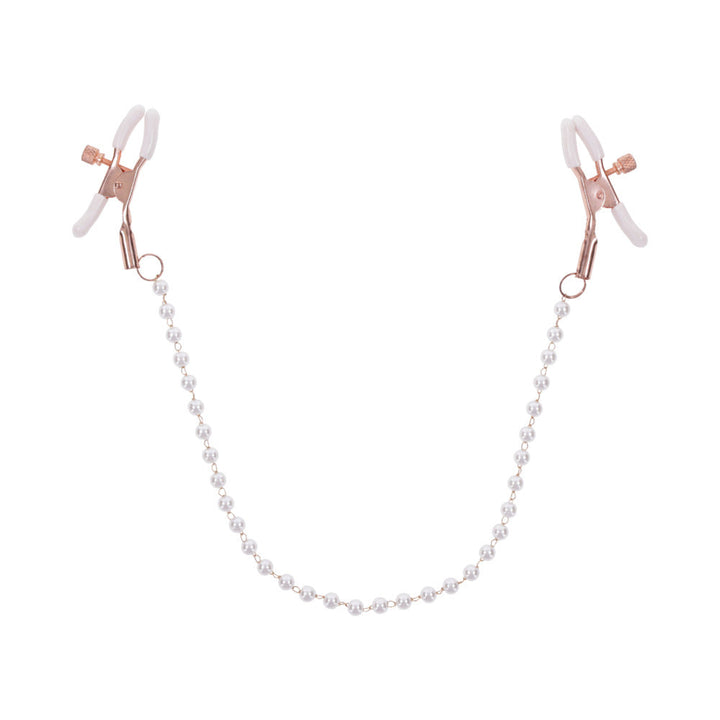 Rose gold adjustable nipple clamps connected by a faux pearl chain with white rubber tips for comfort and grip.