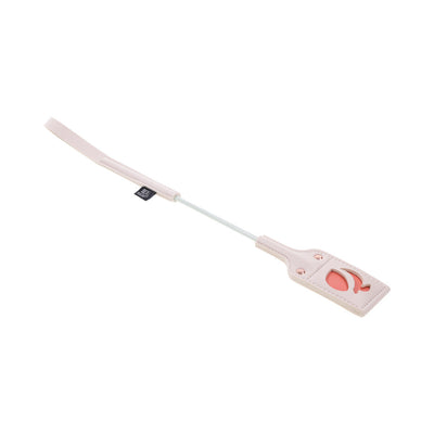 Light pink riding crop with a peach-shaped cutout on the faux leather tip and matching handle loop.