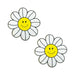 Pair of glittery white daisy-shaped pasties with yellow smiley face centers and black petal outlines.
