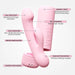 Pink VUSH Glow Rabbit Vibrator with dual stimulation arms, waterproof design, magnetic USB charging, and travel-friendly protective lid.
