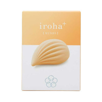 iroha+ KUSHI Renewal soft-touch silicone massager in beige with ribbed, tapered design on peach and white packaging