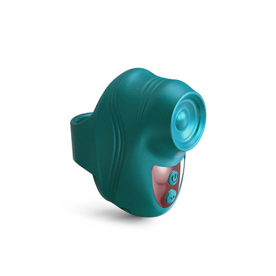 Teal finger-worn personal massager with ergonomic design and control buttons for adjustable tapping intensity.