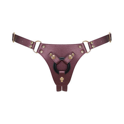 Aubergine leatherette strap-on harness with adjustable gold-tone buckles and a black double stretch silicone ring.