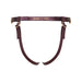 Aubergine leatherette strap-on harness with adjustable gold-tone buckles and logo detail on waistband.
