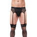 Male model wearing black lace garter belt with matching thigh-high stockings and black underwear on white background.